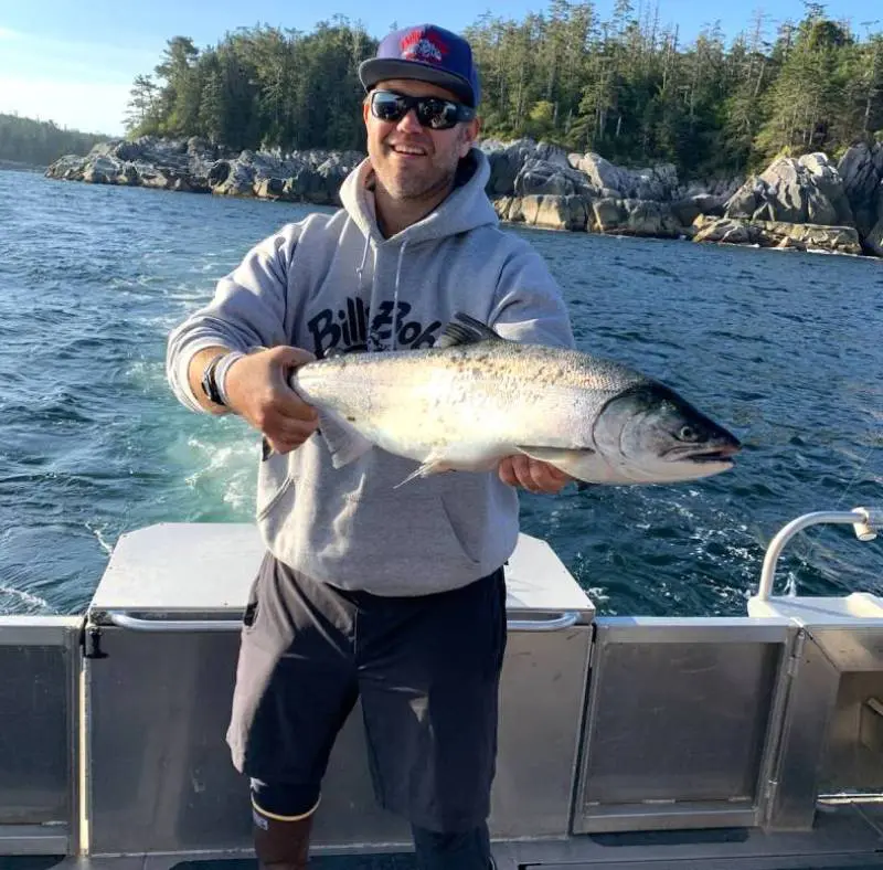 Smiling fisherman with catch