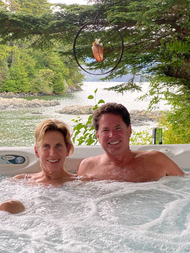 A man and woman in the hot tub